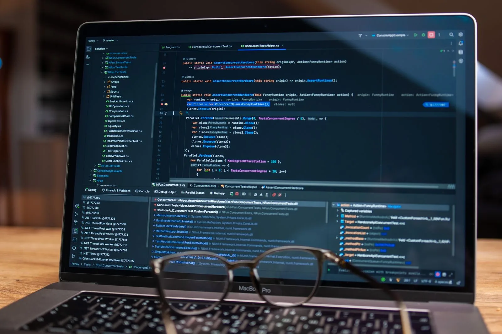 Laptop screen displaying software debugging output, representing automated testing practices