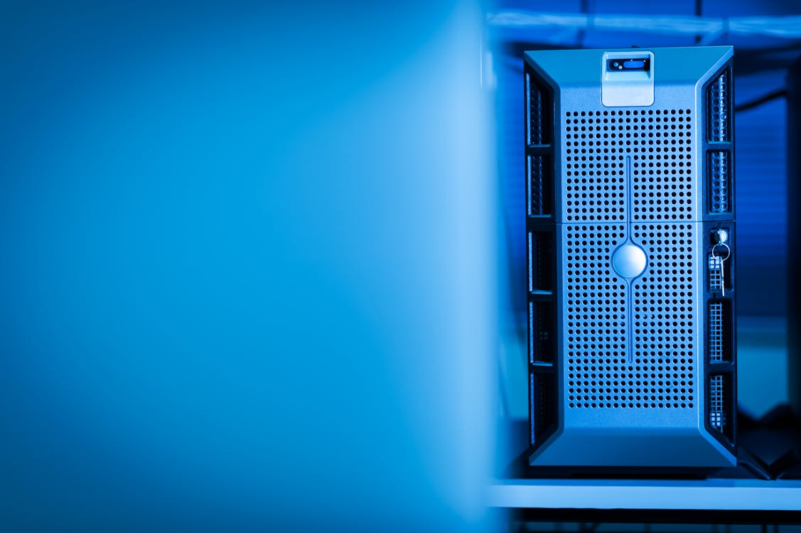 Modern server unit in a blue-lit data center representing cloud infrastructure