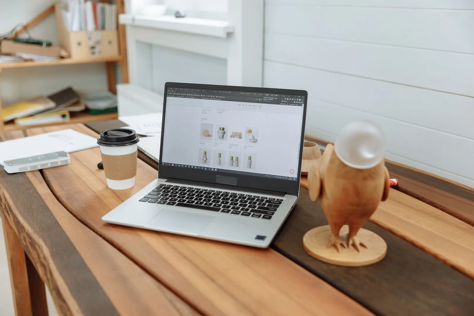 A laptop on a desk displaying a website, representing a business's online presence