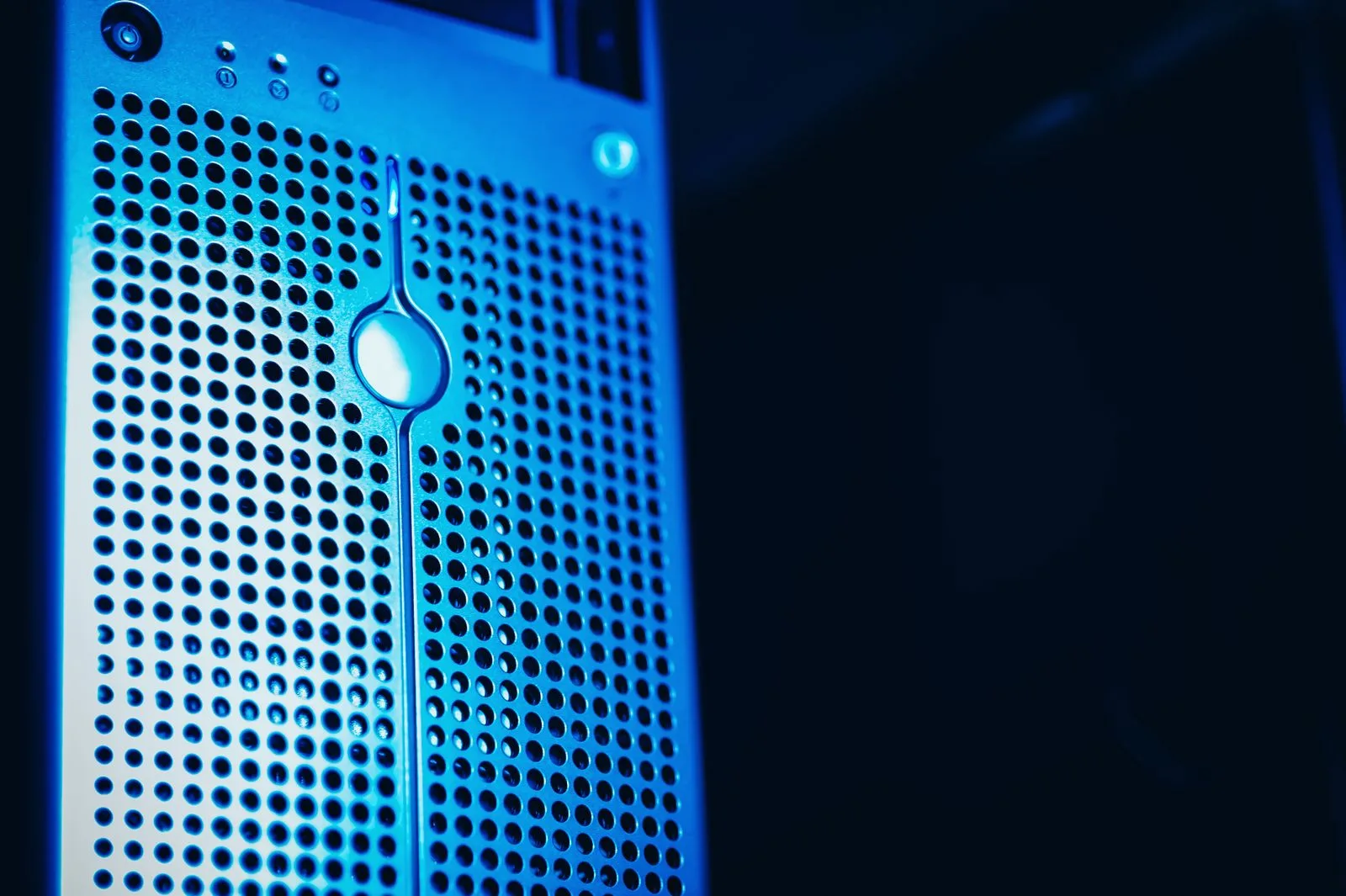 A modern server rack with blue lighting in a secure data center environment