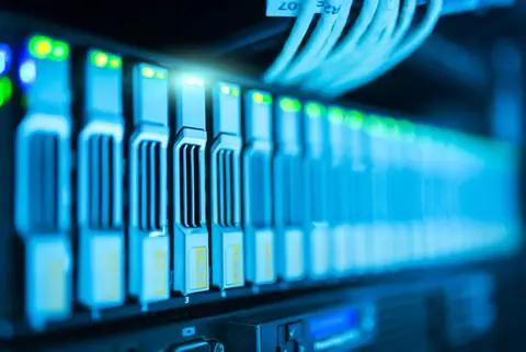 Database server with performance monitoring graphs showing query optimization results
